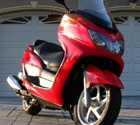 2008 yamaha majesty review motorcycle com, The sporty wheels are a nice touch