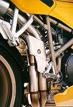 first impression 1997 ducati 748 motorcycle com, The craftsmen at Ducati somehow manage to create art in something as ordinary as a motorcycle s exhaust