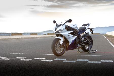 2013 triumph daytona 675r review motorcycle com, Standard model 675s come in Diablo Red Phantom Black or this Crystal White Sapphire Blue edition