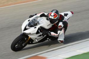 2013 triumph daytona 675r review motorcycle com, Agility is not something the previous 675 ever lacked We re happy to report it may be even better for 2013