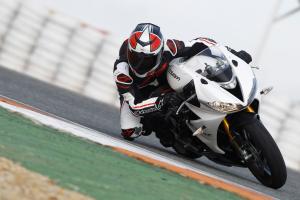 2013 triumph daytona 675r review motorcycle com, Extreme lean angles The 675R is more than willing to go there