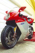 2000 mv agusta f4 strada motorcycle com, Sexy Italian bike against plain white garage door