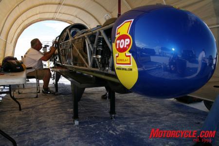 inside rocky robinson s ack attack streamliner, Mike Akatiff at work on the machine he created This was taken in the Top 1 Ack Attack pits at Bonneville during a speed trial Photo courtesy Nathan Allred