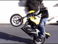 motorcycle com, The Blast doing a wheelie and a burnout