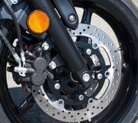 2013 suzuki sfv650 review motorcycle com, While the SFV boasts twin 2 piston Tokico calipers gripping 290mm discs initial bite is underwhelming and stopping performance only moderately impressive They combined with the rear s single 1 piston caliper and 240mm disc get the job done