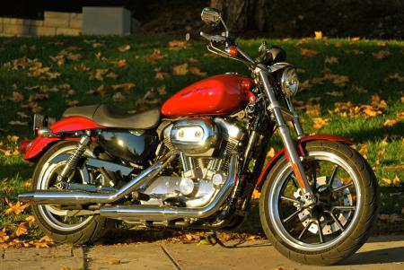 2012 harley davidson sportster superlow review motorcycle com, The 2012 Sportster SuperLow continues a Harley tradition of building a motorcycle that provides a welcoming rider environment with a friendly price tag yet doesn t sacrifice qualities that are distinctly Harley Davidson