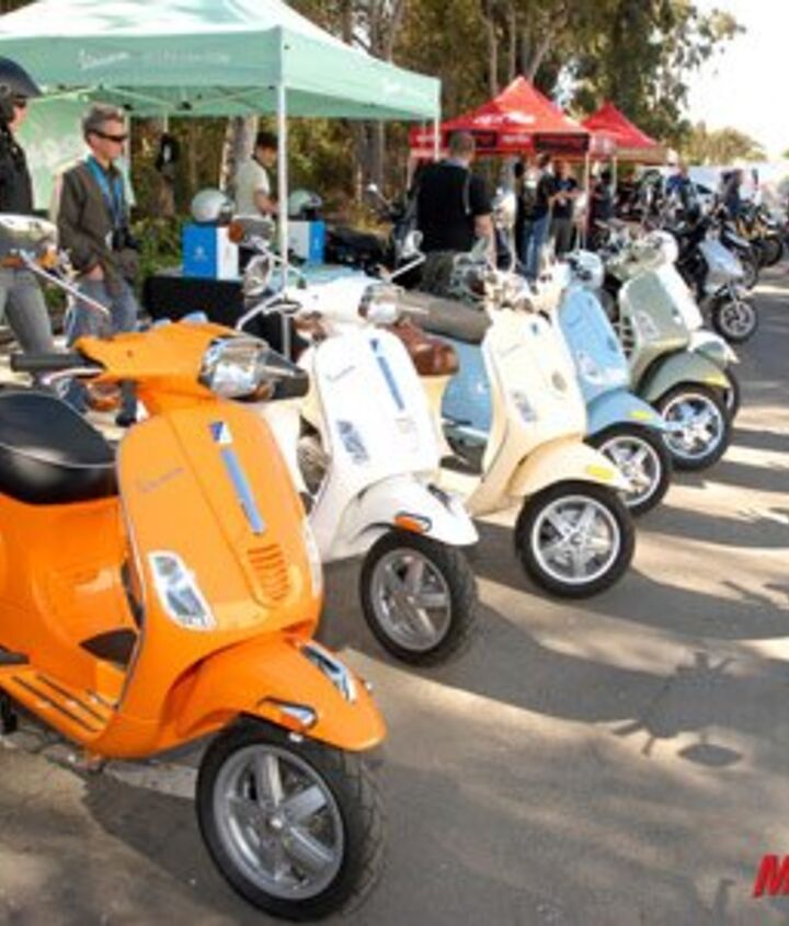 2009 piaggio bv500 scooter review motorcycle com, Like a bag of Skittles spilled on the ground Vespas come in a myriad of colors