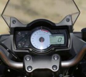 2012 kawasaki versys review motorcycle com, No frills here but the gauge cluster is clean and legible Dual tripmeters are a nice touch as is the adjustable windscreen that shelters riders of various sizes