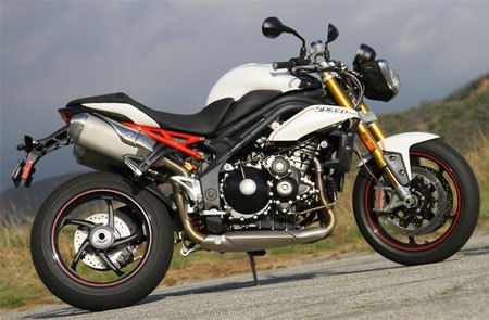 2012 literbike streetfighter shootout video motorcycle com, Oozing top shelf components but powered by the same inline Triple of the standard model the Spreed 3 R arrives to this year s naked bike party sweating its streetfighter title