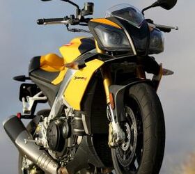 2012 literbike streetfighter shootout video motorcycle com, Potency in the from of 154 rear wheel horsepower and an arsenal of electronic gadgetry the new Aprilia Bumblebee Transformer er Tuono is a naked bike like no other