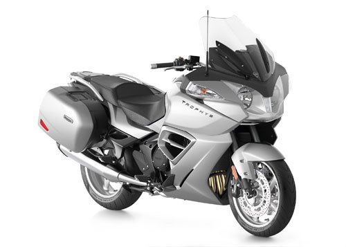 2013 triumph trophy se preview motorcycle com, Besides the omission of protruding cylinder heads and a left side final drive the new Trophy closely resembles the BMW R1200RT We ll bring you a comparison between the two ASAP