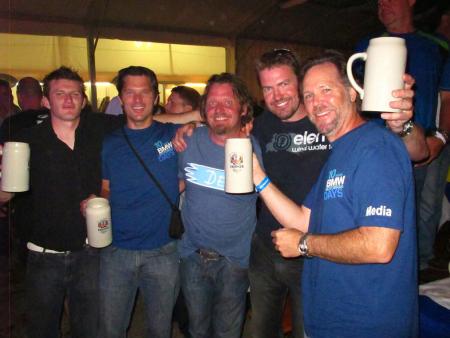 inside bmw from skunk works to motorrad days, Under the big tent in the evenings at Motorrad Days everyone lets their hair down Jon Beck second from left Charlie Boorman third from left Jeff Buchanan right