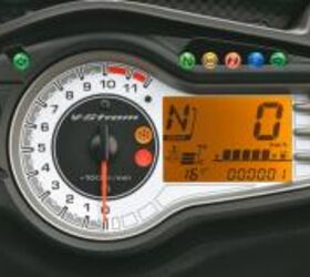 2012 suzuki v strom 650 abs review first ride video motorcycle com, Suzuki modernized the gauge cluster by substituting last year s analog speedo with a digital readout The gear position indicator is also a welcome addition
