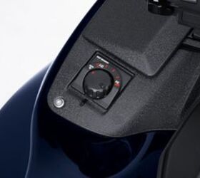 2010 kawasaki concours 14 review motorcycle com, Yep Grip Warmer says it all Just above the grip warmer dial is the new storage compartment
