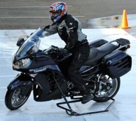 2010 kawasaki concours 14 review motorcycle com, A water soaked sheet of plastic provided the perfect setting to demonstrate the obvious pitfalls of riding a bike on slippery surfaces