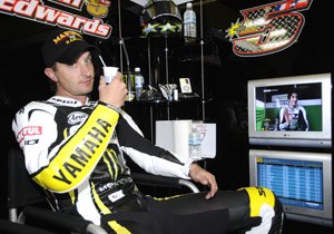 motogp 2009 motegi preview, Colin Edwards does his best Bruce Allen impersonation lounging comfortably with a beverage watching the coverage on the monitor