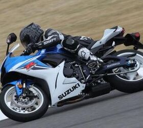 2011 suzuki gsx r600 review motorcycle com, Dark clouds over Barber Motorsports Park held back their wet gift giving the moto media virtually the entire day to circulate Barber s flowing circuit aboard the new GSX R600