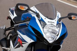 2011 suzuki gsx r600 review motorcycle com, The new stacked headlight along with new bodywork was part of the 600 s weight loss program Between the headlamp and bodywork Suzuki clipped another 8 7 pounds