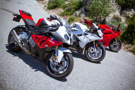 2012 european literbike shootout video motorcycle com, The BMW S1000RR left Aprilia RSV4 R APRC center and Ducati 1199 Panigale S represent three of the hottest sportbike exports to come out of Europe