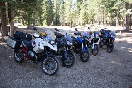2012 adventure touring shootout video motorcycle com, Adventure Touring implies epic rides of unending seat time traversing a variety of surfaces To excel at their task A T motorcycles require an assorted skillset