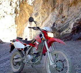 2009 kawasaki klx250s review motorcycle com, Nimble go anywhere says Kawi From urban canyon walls to the eroded earthen passages the 09 KLX passes the test for commuters as well as recreationalists