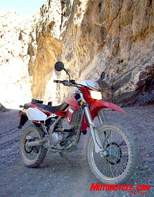 2009 kawasaki klx250s review motorcycle com, Nimble go anywhere says Kawi From urban canyon walls to the eroded earthen passages the 09 KLX passes the test for commuters as well as recreationalists