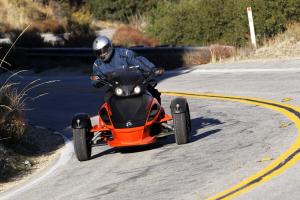 2012 can am spyder roadsters review video motorcycle com, The Spyder RS is a livelier and sportier machine than the luxurious RT both in feel and in its riding position