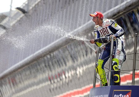 motogp 2009 catalunya results, Valentino Rossi supplies some wet weather conditions of his own