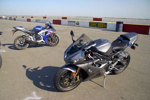 choose your weapon best of the best 2006 motorcycle com, Like a lot of four cylinder machines the GSXR 1000 really comes with two motors The first one is handy on the street with all of Suzuki s tuning tricks