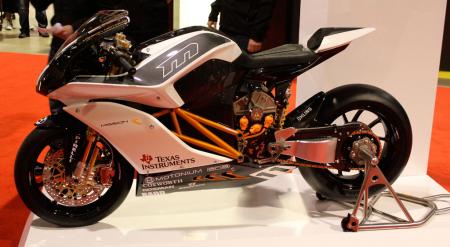 2010 long beach progressive ims report, This work of electric moto art is tantamount to Mission Motors business card as it uses such eye candy to attract money from its other ventures selling to automakers needing smart EV solutions and other manufacturers of EVs not necessarily on two wheels