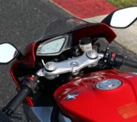 2013 mv agusta f3 675 review video motorcycle com, The F3 s electronic instruments keep tabs on the various MVICS systems Mirrors are placed too close together for a clear rearward view