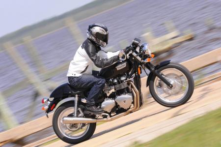 2009 triumph thruxton review motorcycle com, The Arrow 2 into 1 full exhaust maybe a skosh pricey but the look and sound the system provides on the Thruxton is priceless