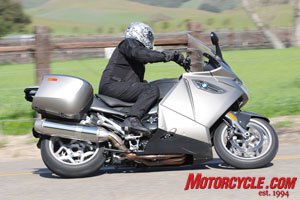 2009 bmw k1300gt review motorcycle com, The sport touring K bike initiates turns well thanks to leverage offered by high and wide bars The combination of an excellent chassis and electronically adjustable suspension ESA II round out the handling package quite nicely