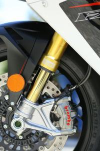 2013 mv agusta f4 rr review street ride motorcycle com, TiN treated hlins fork and TTX shock are of the electronic adjustment variety and highlight the upgrades to this Year s F4 RR But don t forget the Brembo monobloc M50 calipers exclusive last year to Ducati s Panigale