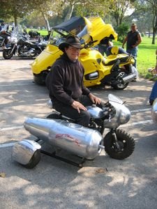 2004 griffith park sidecar rally, Bob Foster toddles around on his custom 1970 Honda Mini Trail rocket sidecar that s actually an ice chest Push a button and a cloud of while smoke pours from the rear of the rocket