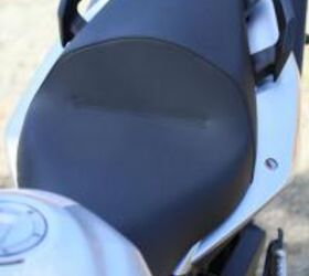 2011 aprilia shiver 750 review motorcycle com, A narrower saddle joins lower handlebars and footpegs moved rearward as refinements to rider ergos on the latest Shiver A flyscreen is now also standard