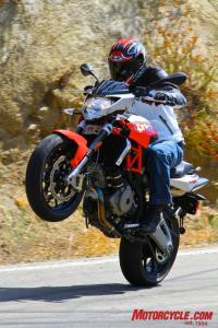 2011 aprilia shiver 750 review motorcycle com, Antics like this are well within reach for the Shiver s 90 degree Twin The 750 makes about the same power but less torque as Ducati s new Monster 796 However the Aprilia s engine character is such that it feels like the more potent of the two Twins