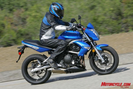2009 kawasaki er 6n review motorcycle com, A sporty yet comfortably upright riding position accommodates most everyone but tall riders might want to fit a thicker saddle to expand the seat to peg distance