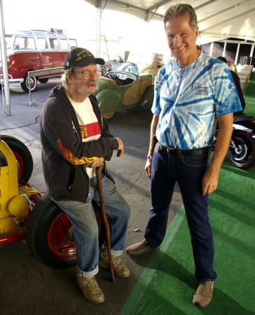 bud ekins frenzy at petersen museum auction, An icon of the industry and himself highly collectible Mike Parti left hotrodder restorer extraordinaire chats with Glenn Bator a mover and shaker in classic bike sales and events via Bator International