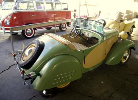 bud ekins frenzy at petersen museum auction, A super cute clown friendly 1950 Bantam roadster was a bargain at 17 000 A second Bantam seen in the background brought 14 000 The 1969 21 window Samba VW van brought a whopping 67 500