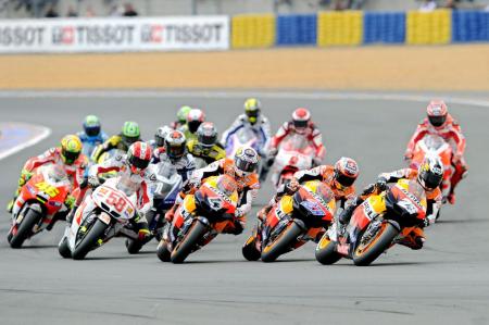 motogp 2011 le mans results, The first four rows of the Le Mans starting grid almost seemed to be organized by manufacturer with four Hondas up front followed by four Yamahas then three Ducatis before the lone Suzuki GEPA pictures Gold and Goose Gareth Harford