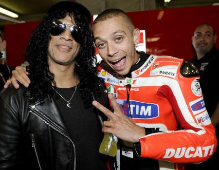 motogp 2011 le mans results, On a day where his very first podium finish with Ducati was overshadowed by Dani Pedrosa s crash Valentino Rossi recruits Guns n Roses Slash to help reclaim some thunder
