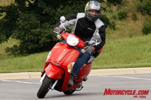2010 kymco scooter lineup intro motorcycle com, The 2010 Like 50 will no doubt draw comparisons to the Vespa LX 50