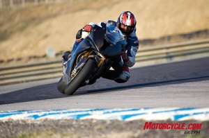 2009 bmw s1000rr preview motorcycle com, The S1000RR appears quite narrow and compact A centrally located ram air duct crams high pressure air into the inline Four engine