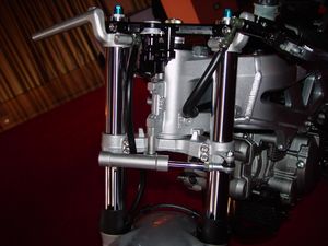 suzuki sv 1000s fast n fun for everyone motorcycle com, The 2003 SV 1000s come with this handy dandy steering damper for those impromptu races down the autopista