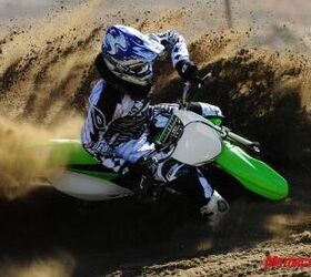 2010 kawasaki kx450f review motorcycle com, JW loves to destroy berms Strong bite from the KX s front end aided his assault