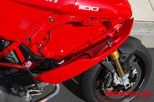 church of mo 2009 ducati multistrada 1100 s review, The right side body panel opens via the ignition key and houses a few tools as wells as making an inconspicuous storage compartment