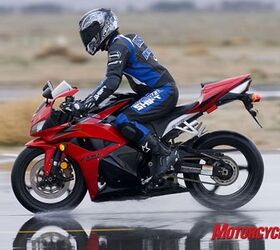 2009 honda cbr600rr c abs review motorcycle com, Bringing the CBR C ABS down from 100 mph in standing water with full squeeze on both brakes Note the distance between the front fender and upper cowling as well as how little fork compression is left Smooth stopping all the way
