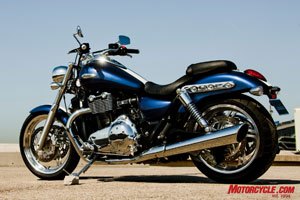 2010 triumph thunderbird review motorcycle com, Note the Thunderbird s uncluttered engine with machined fins and the jaunty exhaust pipes