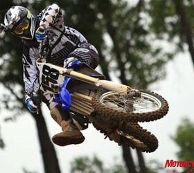 2010 yamaha yz450f review motorcycle com, Not quite a full Bubba scrub but far from Fonzie s ride position on the track